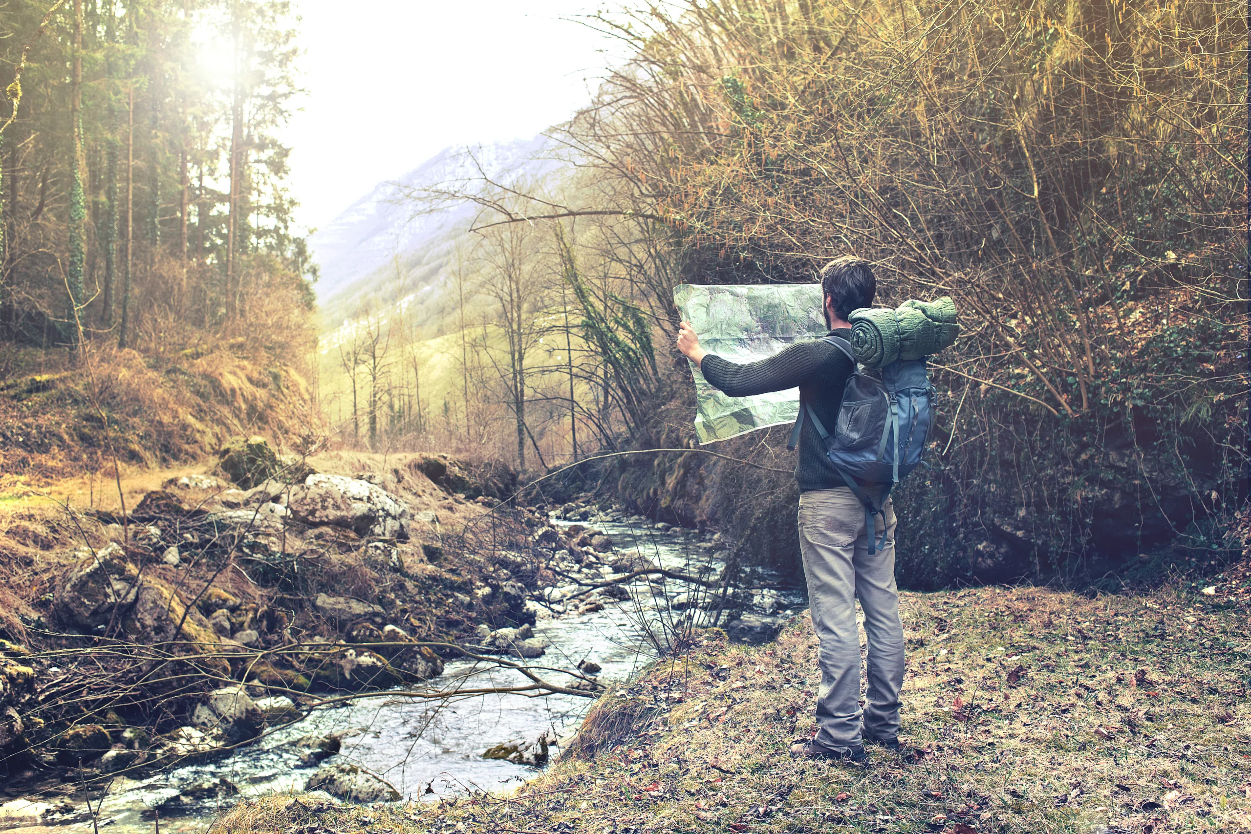 Lost,Man,Observing,Map,To,Find,The,The,Right,Way